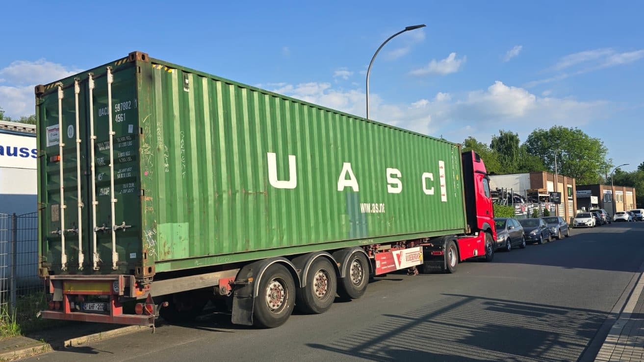 40-foot shipping container on a semi-trailer, doors closed